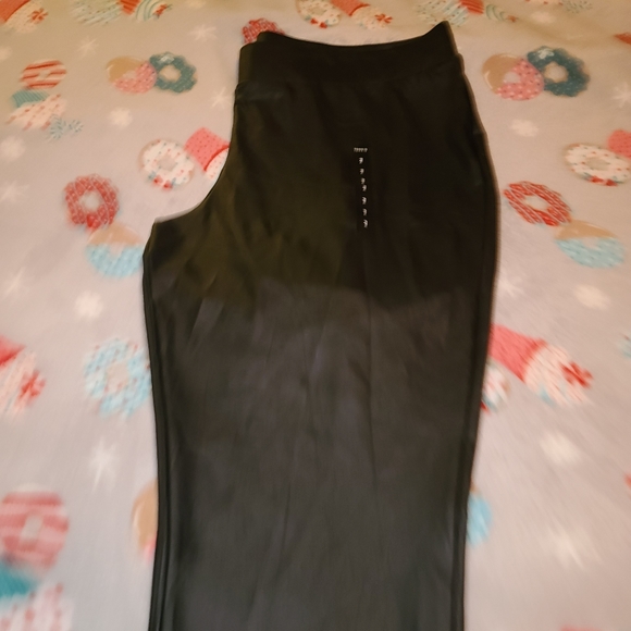 Torrid faux leather stretchy leggings. NWT. Black. - Picture 3 of 9